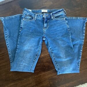 Medium wash pacsun low rise flared leg jeans